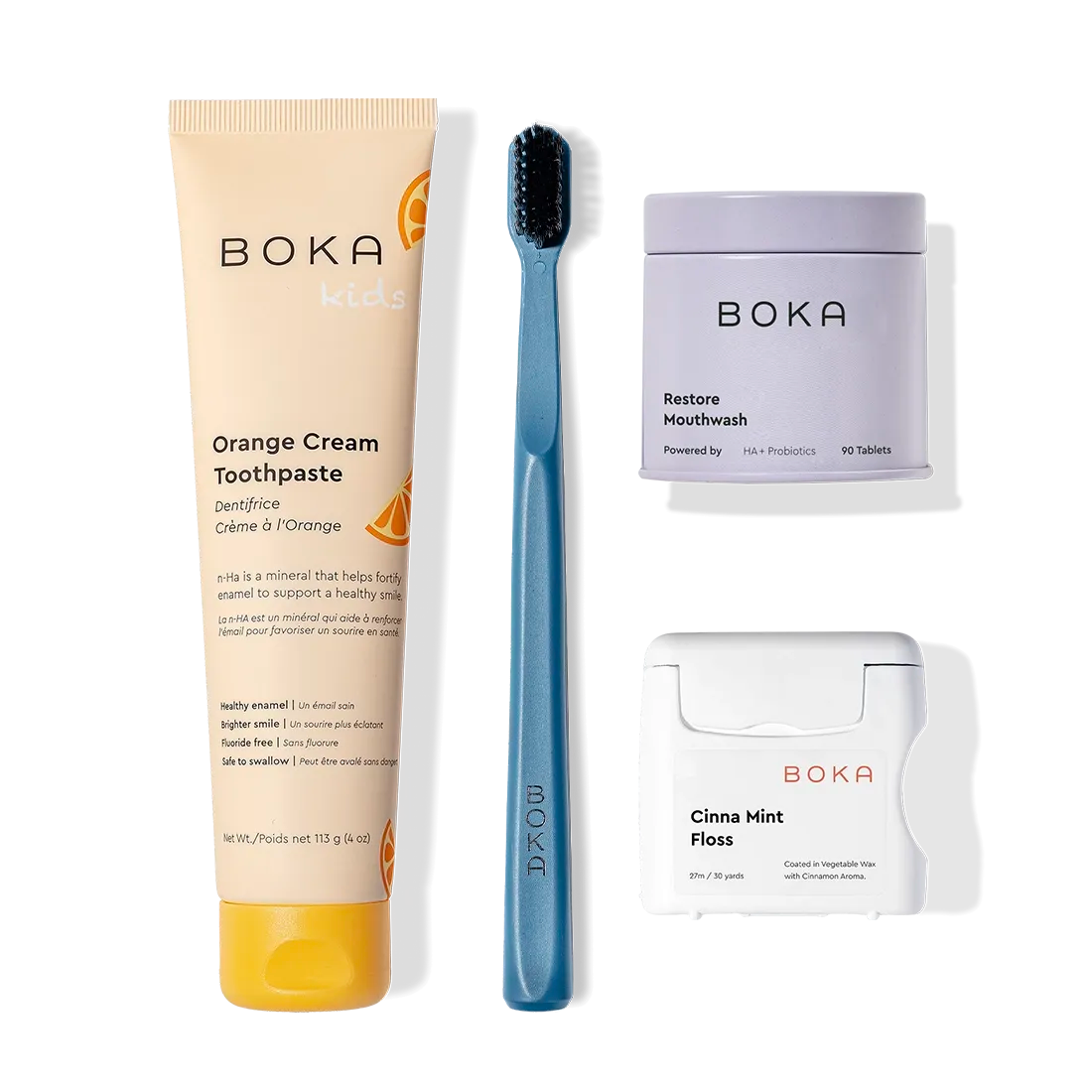The Advanced Kit includes safe-to-swallow Boka kids toothpaste, a blue brush, floss, and mouthwash tabs.