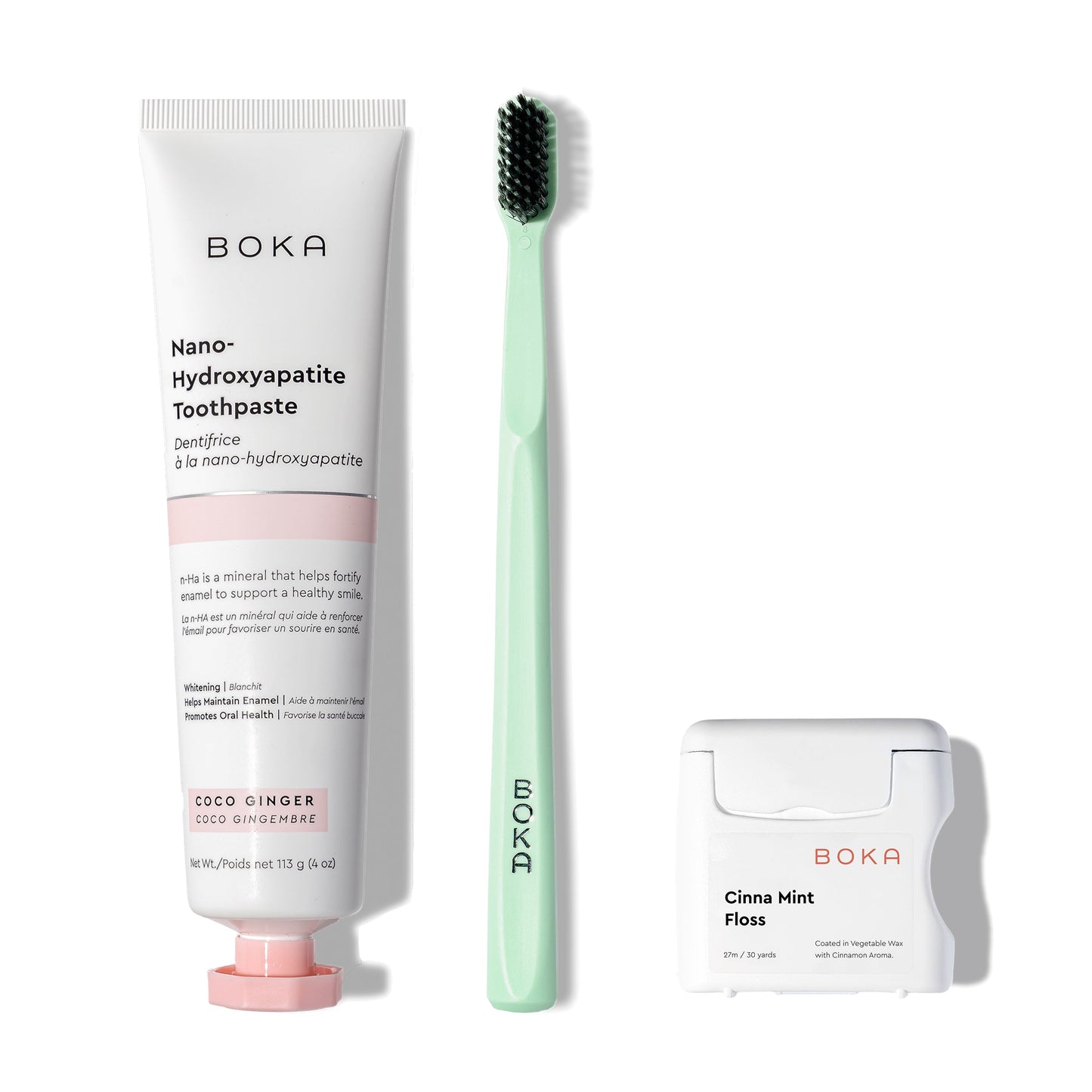 The Classic Kit—nano-hydroxyapatite toothpaste, mint-green brush, and teflon-free floss on white.