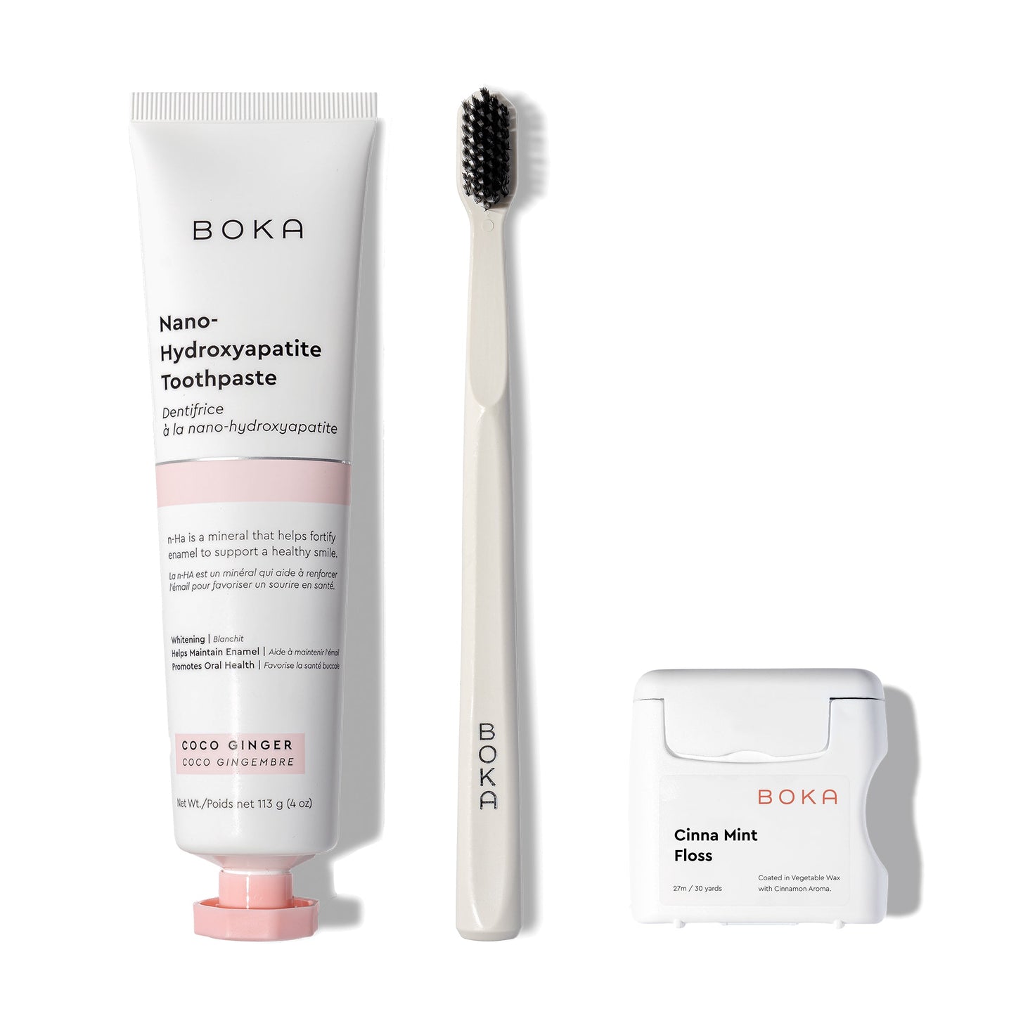 Classic Kit: toothpaste, teflon-free floss, and charcoal bristle brush on white background.