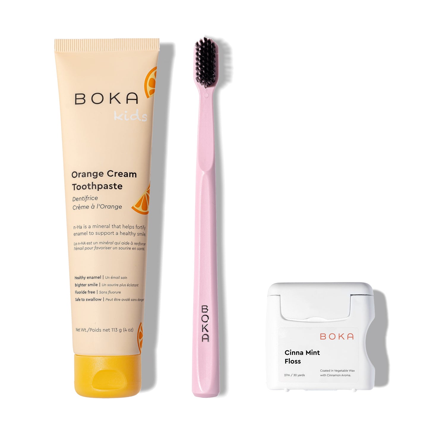 Boka Classic Kit: nano-hydroxyapatite toothpaste, pink brush, and teflon-free floss.