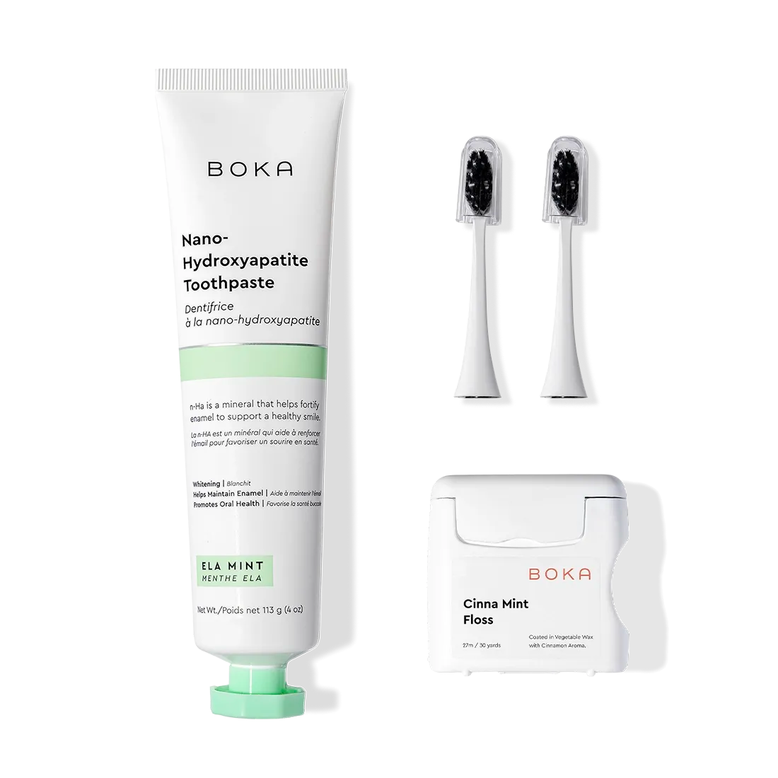 Boka Kit Refill shown with nano-hydroxyapatite toothpaste, teflon-free floss, and charcoal brush heads.