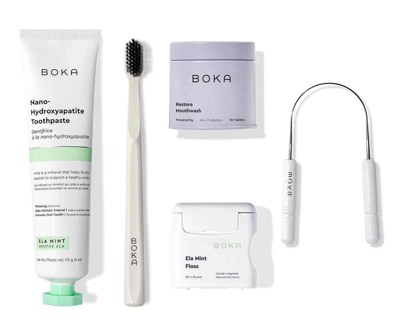 Complete Kit: toothpaste, black toothbrush, mouthwash tablets, floss, and tongue scraper.