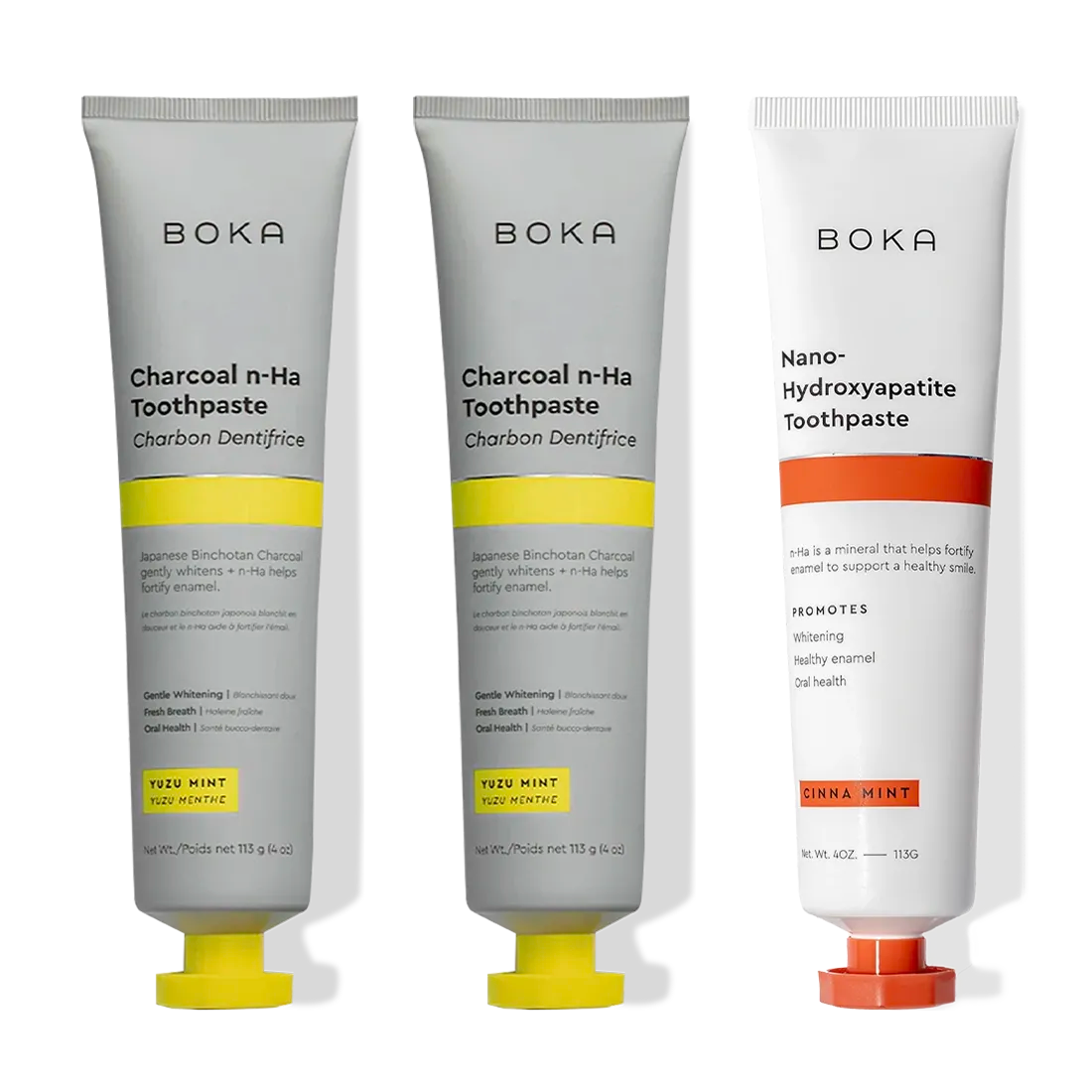 Three Charcoal Yuzu Mint Whitening n-Ha Toothpaste tubes (3-pack) for a naturally brighter smile.