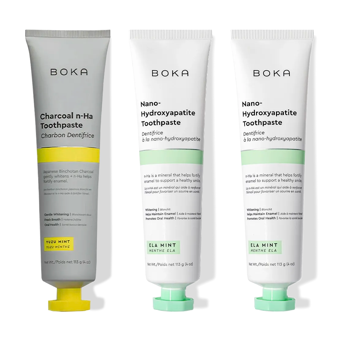 Three Charcoal Yuzu Mint Whitening n-Ha Toothpaste 3-packs, displayed upright on a white surface.
