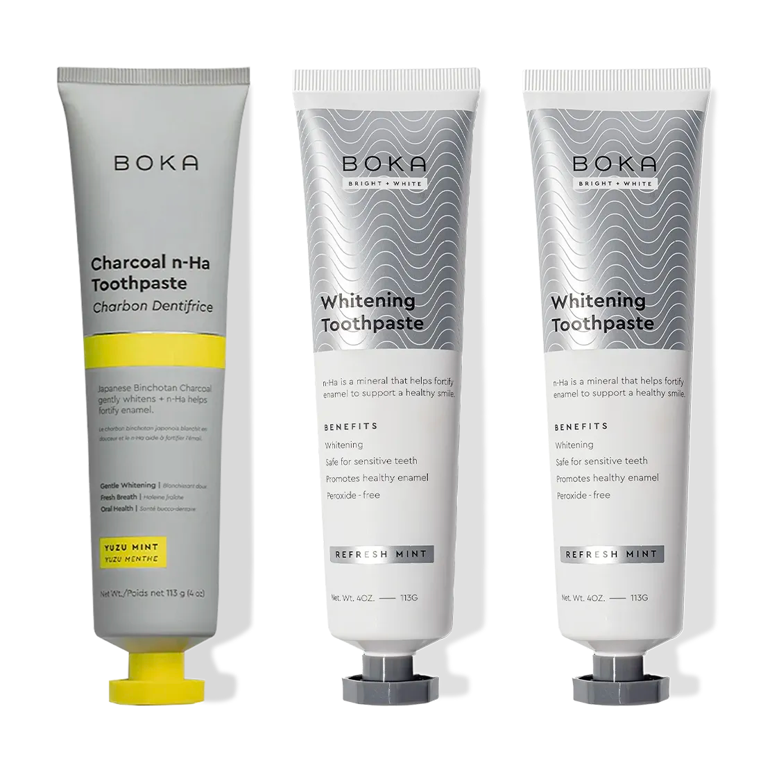 Three Charcoal Yuzu Mint Whitening n-Ha Toothpaste tubes stand upright in a 3-pack.