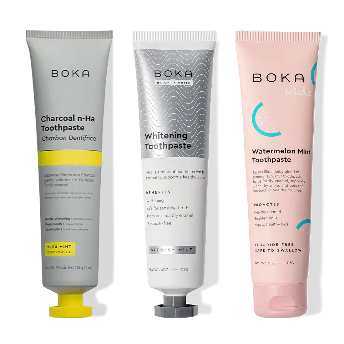 Three Charcoal Yuzu Mint Whitening n-Ha Toothpaste tubes stand upright for a brighter smile.