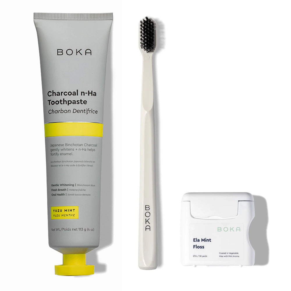 Classic Kit with Boka toothpaste, toothbrush, and teflon-free floss on a white background.