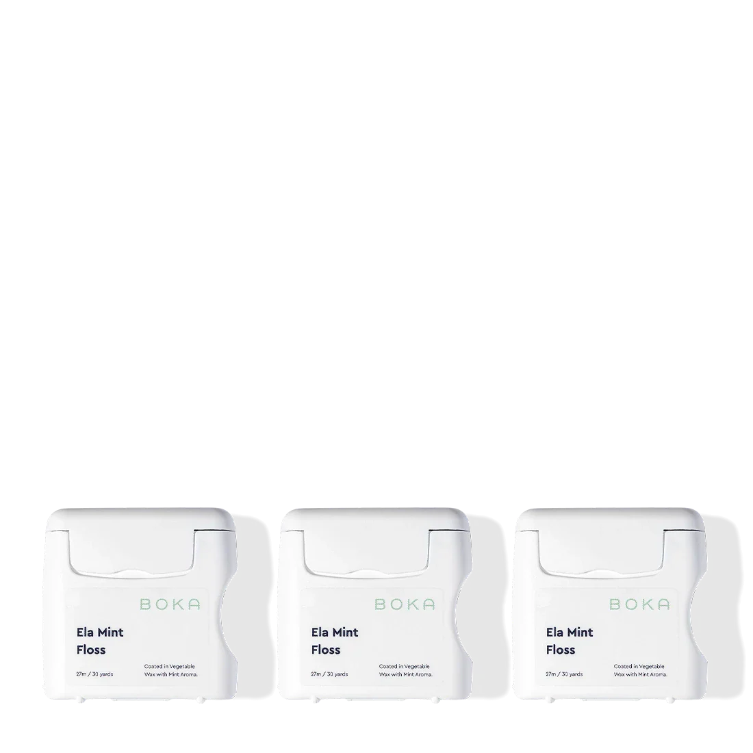Three Boka Floss - Ela Mint containers, in white, are lined up on a plain background.