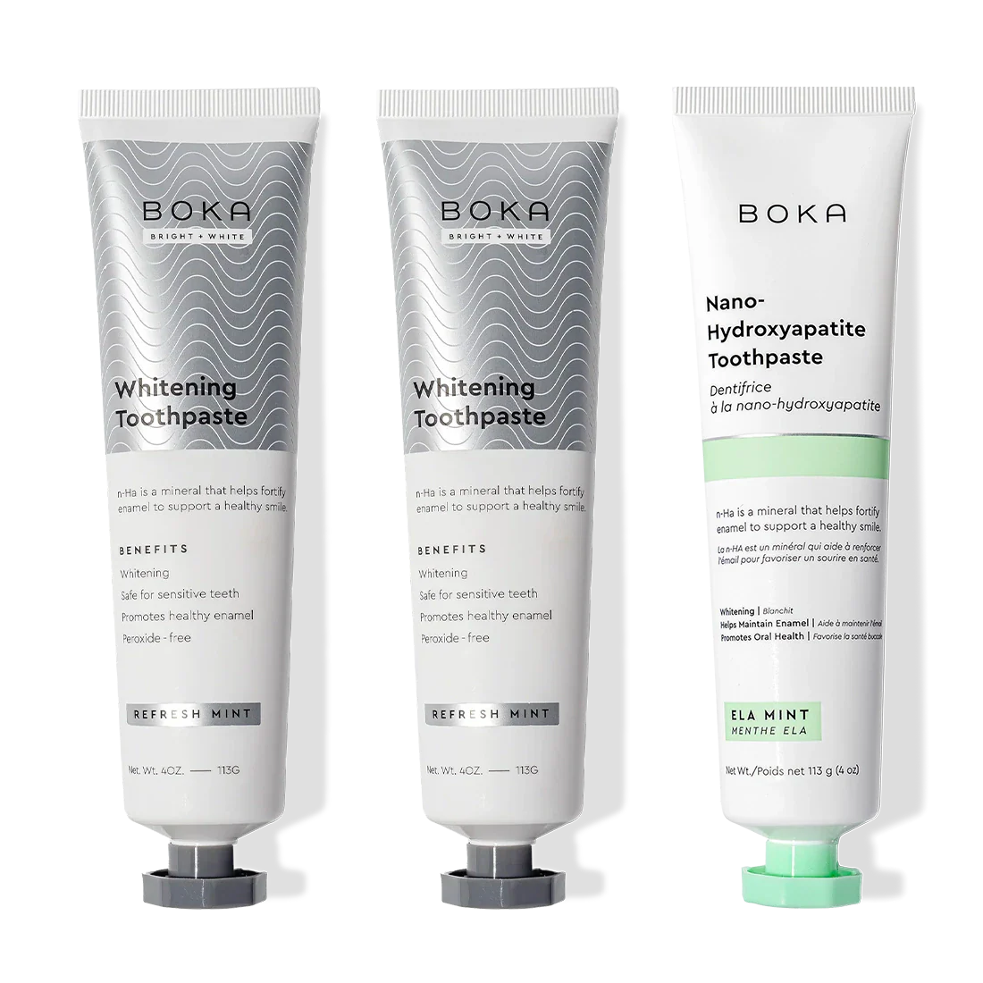 Gallery view - Three upright Nano (n-Ha) Toothpaste Whitening 3 Pack tubes: two silver, one white and green.