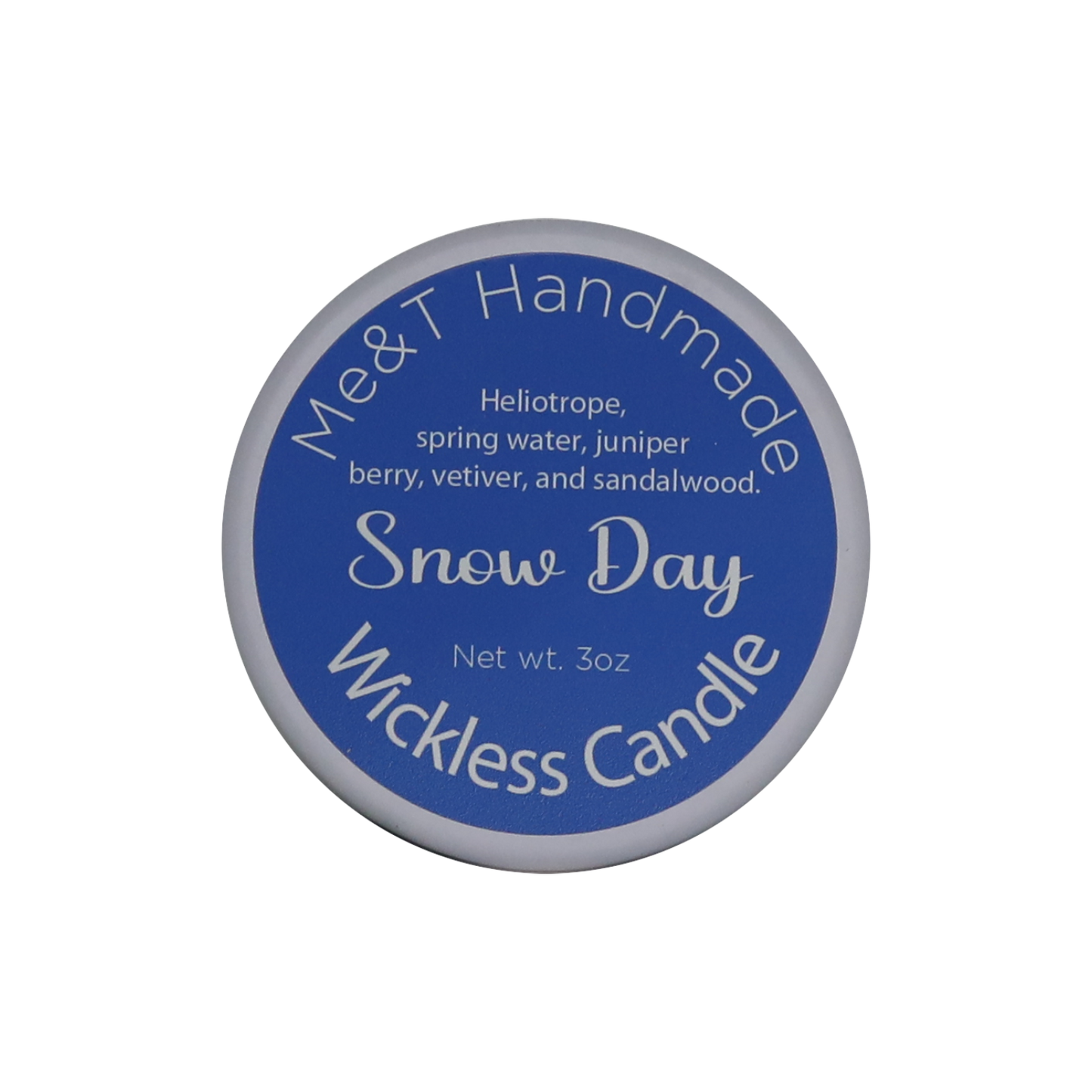 Snow Day Wickless candle shown from the top in a white tin with a blue label