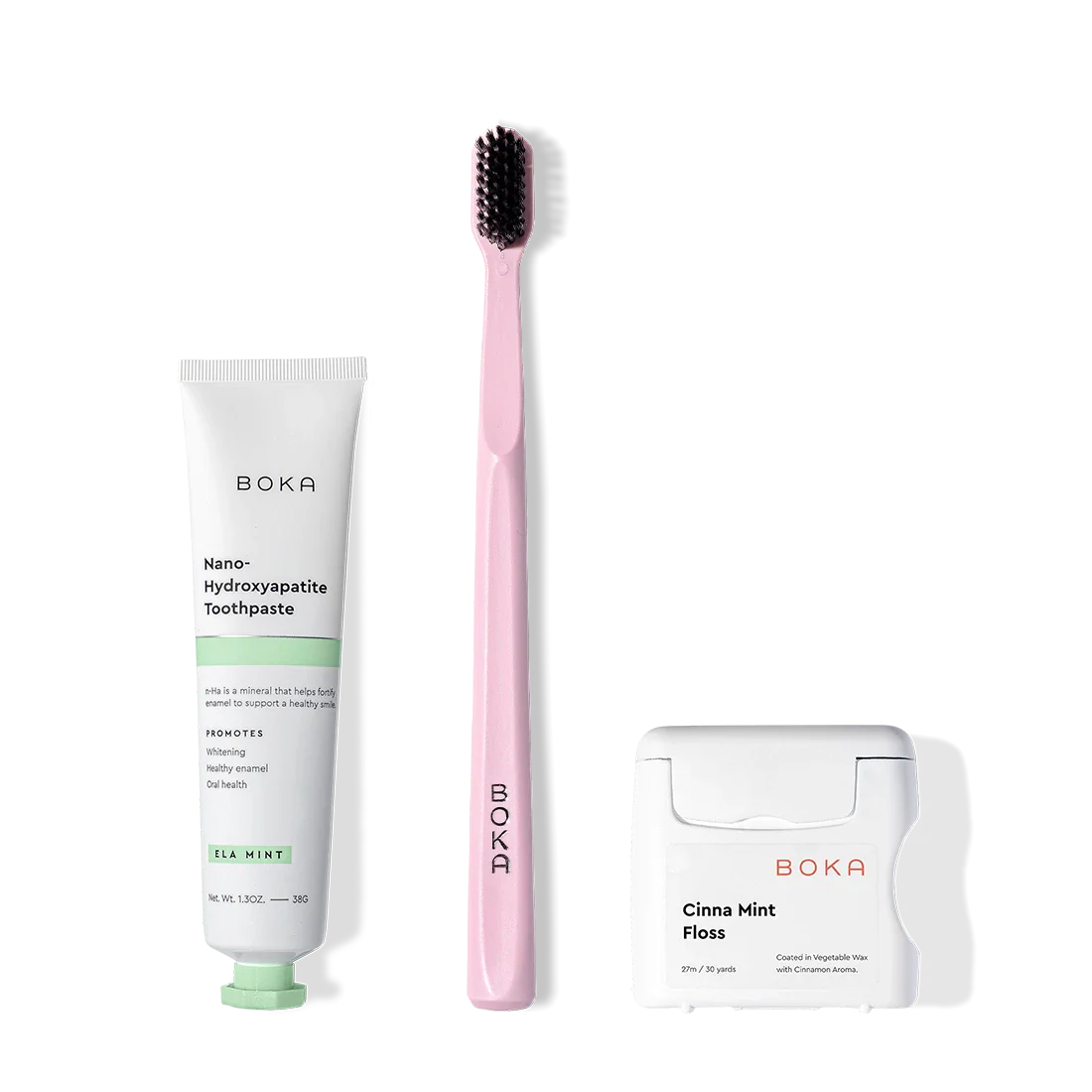 Boka Travel Kit displayed, including nano-hydroxyapatite toothpaste, toothbrush, and teflon-free floss.