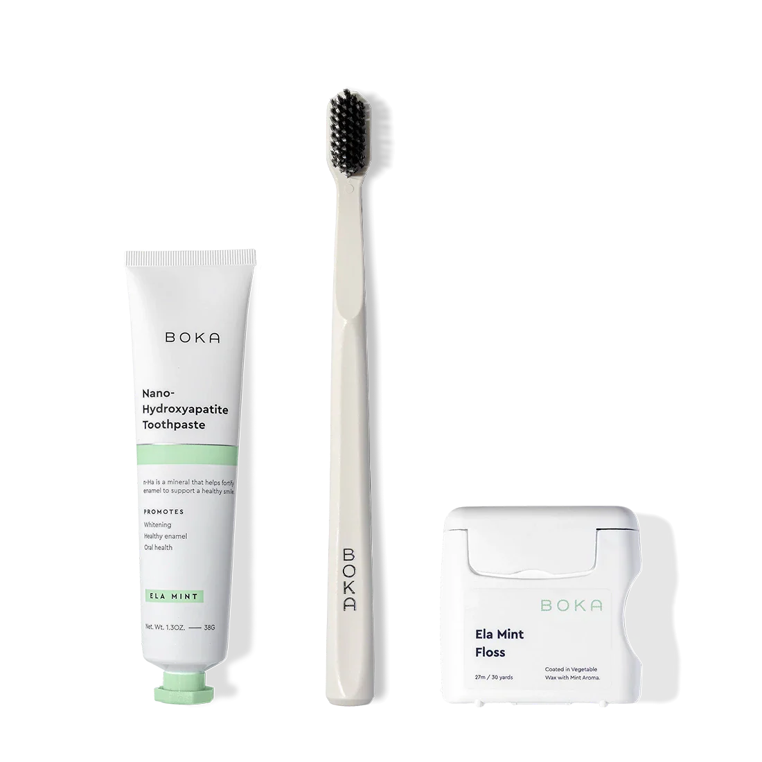 Travel Kit on display: includes toothpaste, charcoal toothbrush, and teflon-free floss.