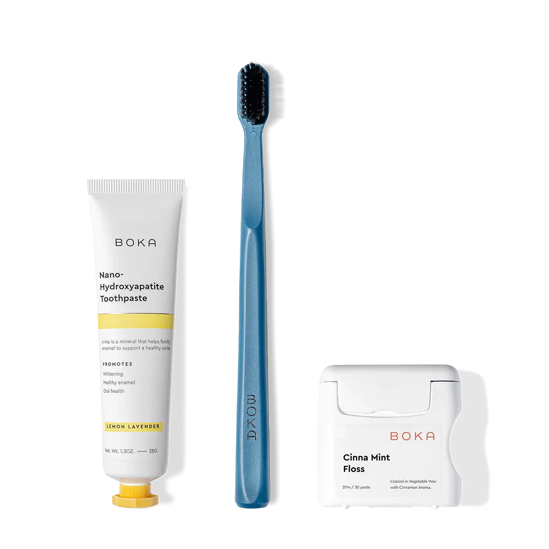 A Travel Kit with toothpaste, a blue charcoal toothbrush, and Cinna Mint floss.