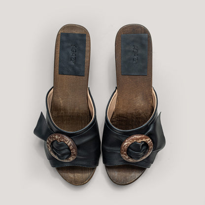 "Coconut shy” vegan grape leather clogs