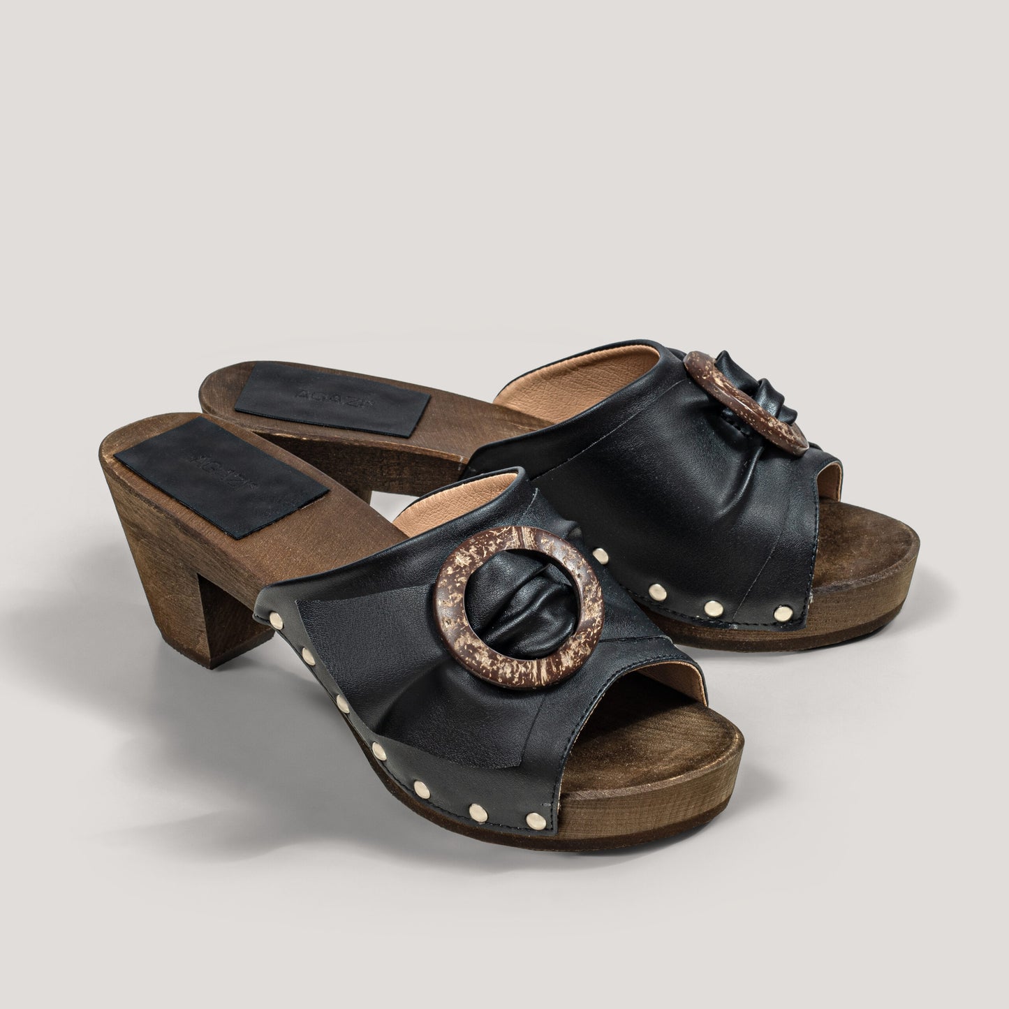 "Coconut shy” vegan grape leather clogs