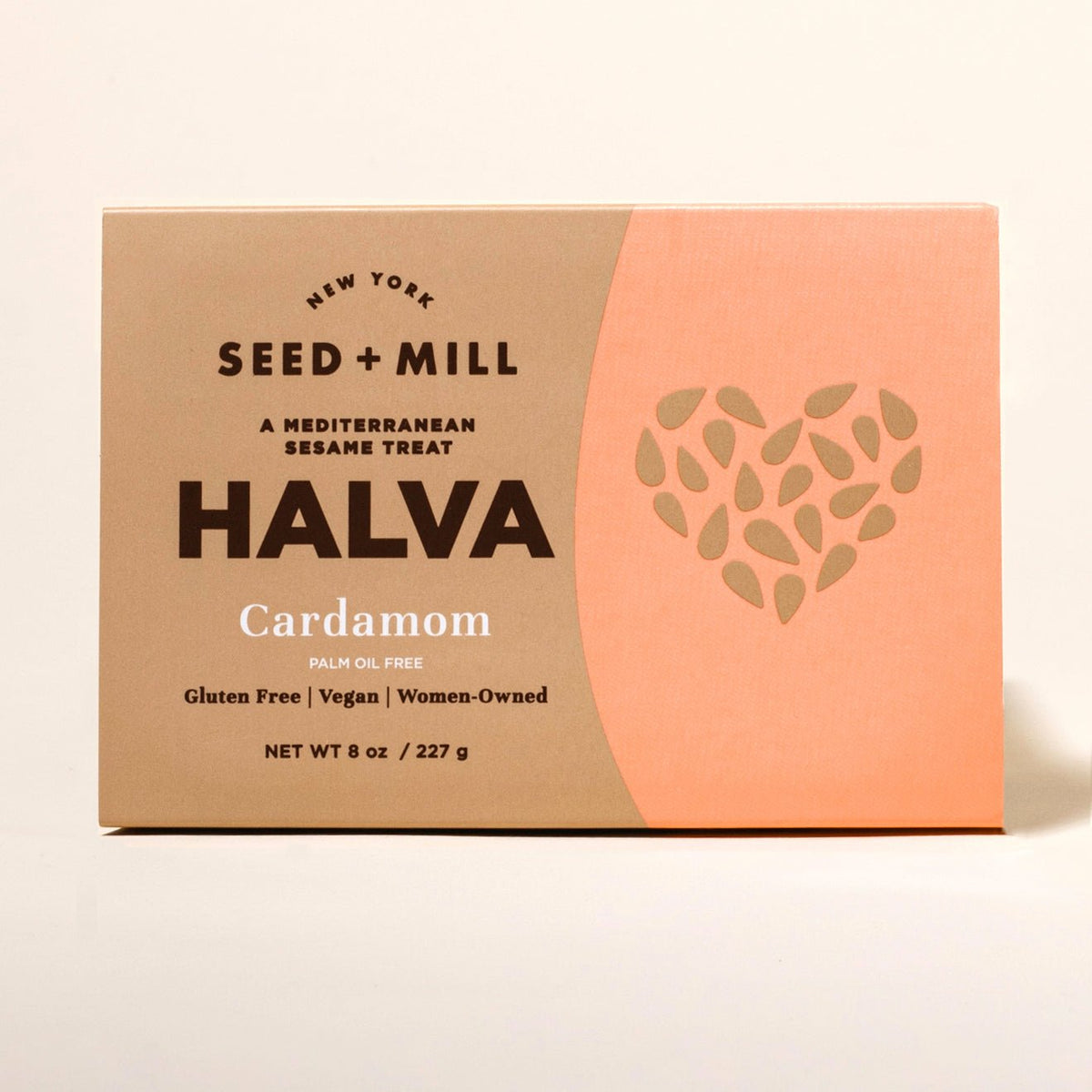 Box of Seed + Mill Cardamom Halva on a beige background