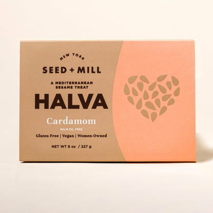 Box of Seed + Mill Cardamom Halva on a beige background