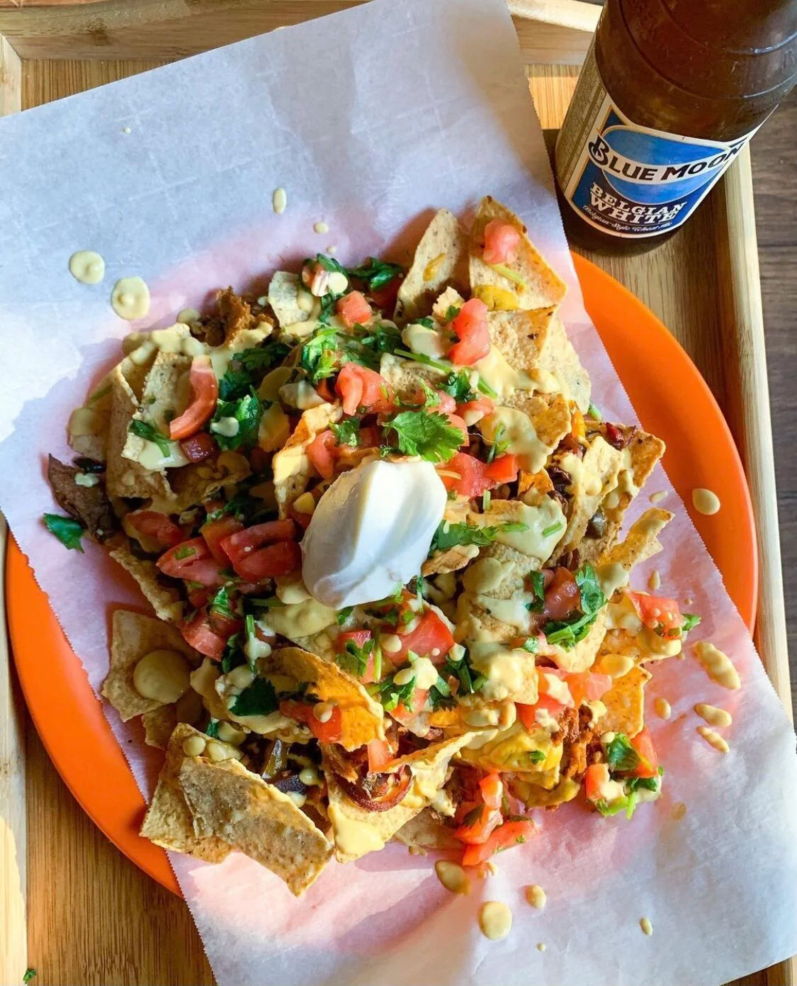Blackbird Plant-Based Chili Lime Seitan topped on vegan nachos