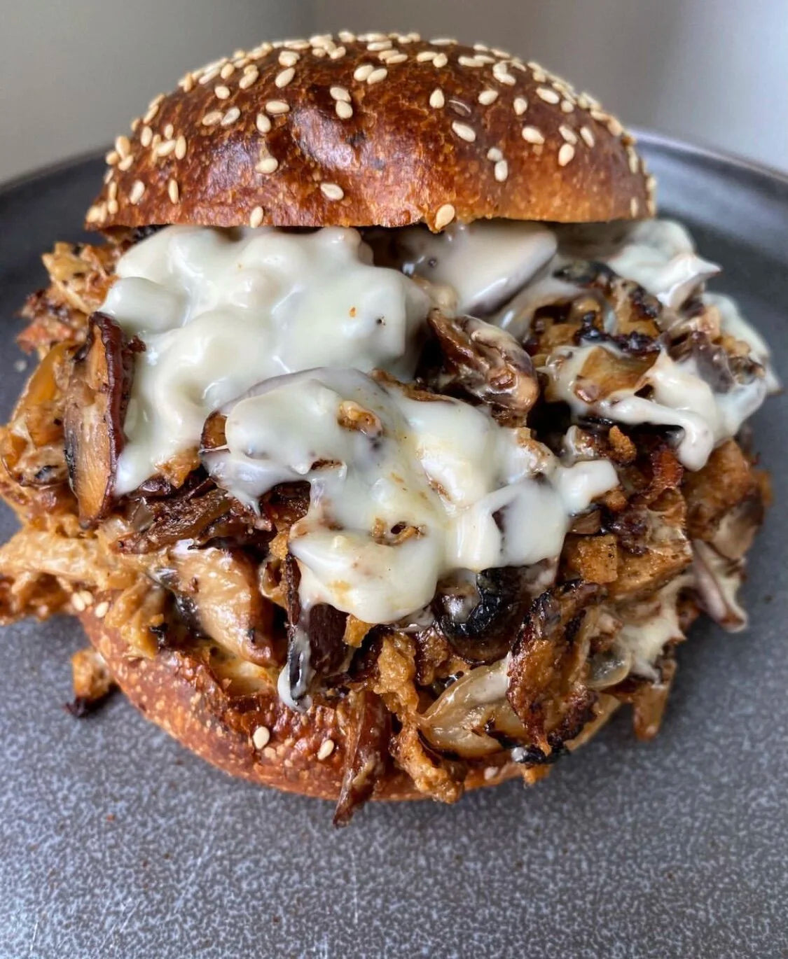 Blackbird Plant-Based Texas BBQ Seitan on a vegan pulled pork sandwich