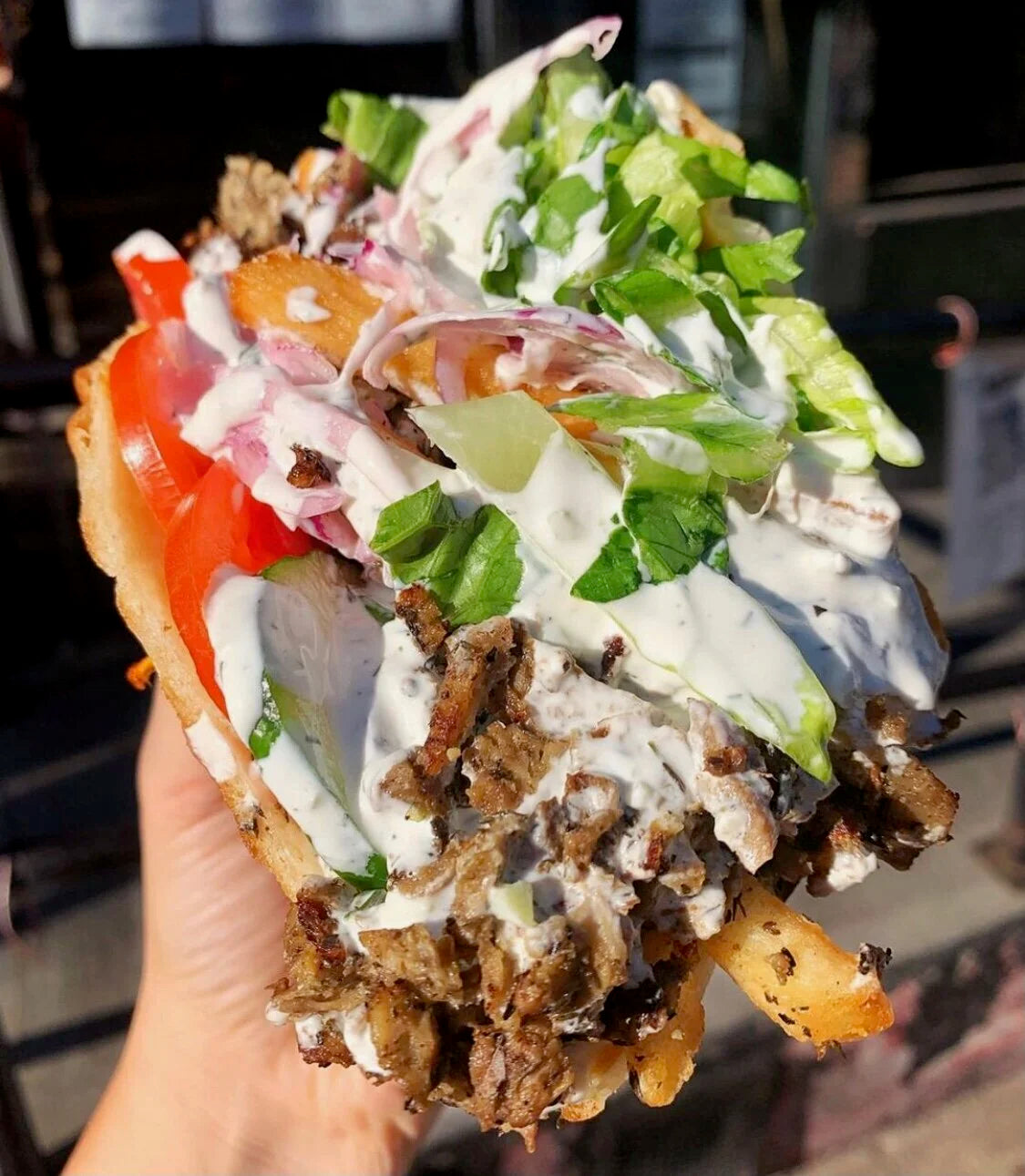 Blackbird Plant-Based Rosemary Garlic Seitan on a vegan gyro sandwich