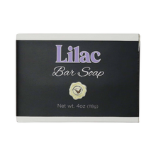 Lilac bar soap in a white box with a black label and lilac type