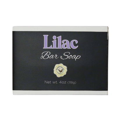 Lilac bar soap in a white box with a black label and lilac type