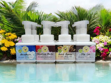 Me&T foaming hand soaps with greenery behind them for category image and foaming hand soap refill image