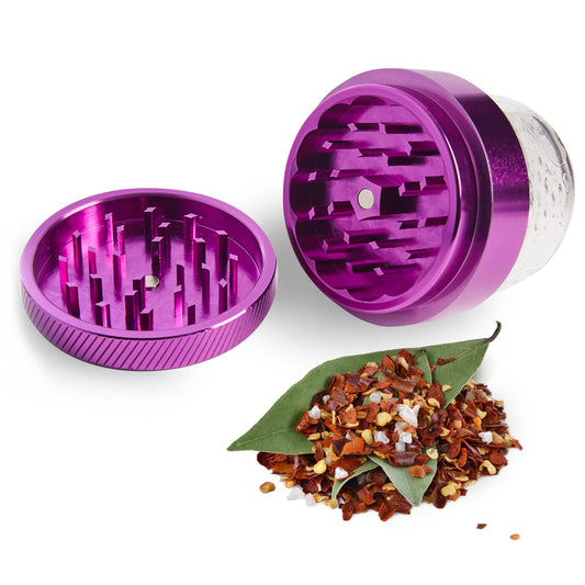 purple herb grinder on a white background