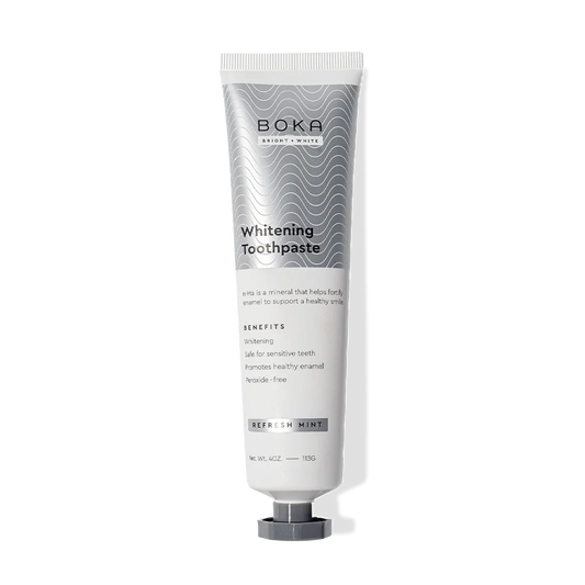 Gallery view - A tube of Refresh Mint Whitening n-Ha Toothpaste for sensitive teeth, upright on white background.