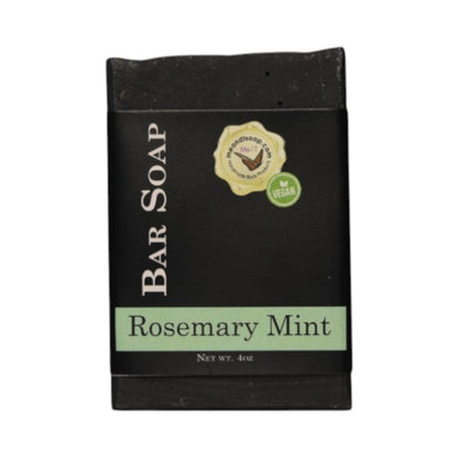Rosemary Mint Bar soap shown with a black wrapper and a green fragrance bar