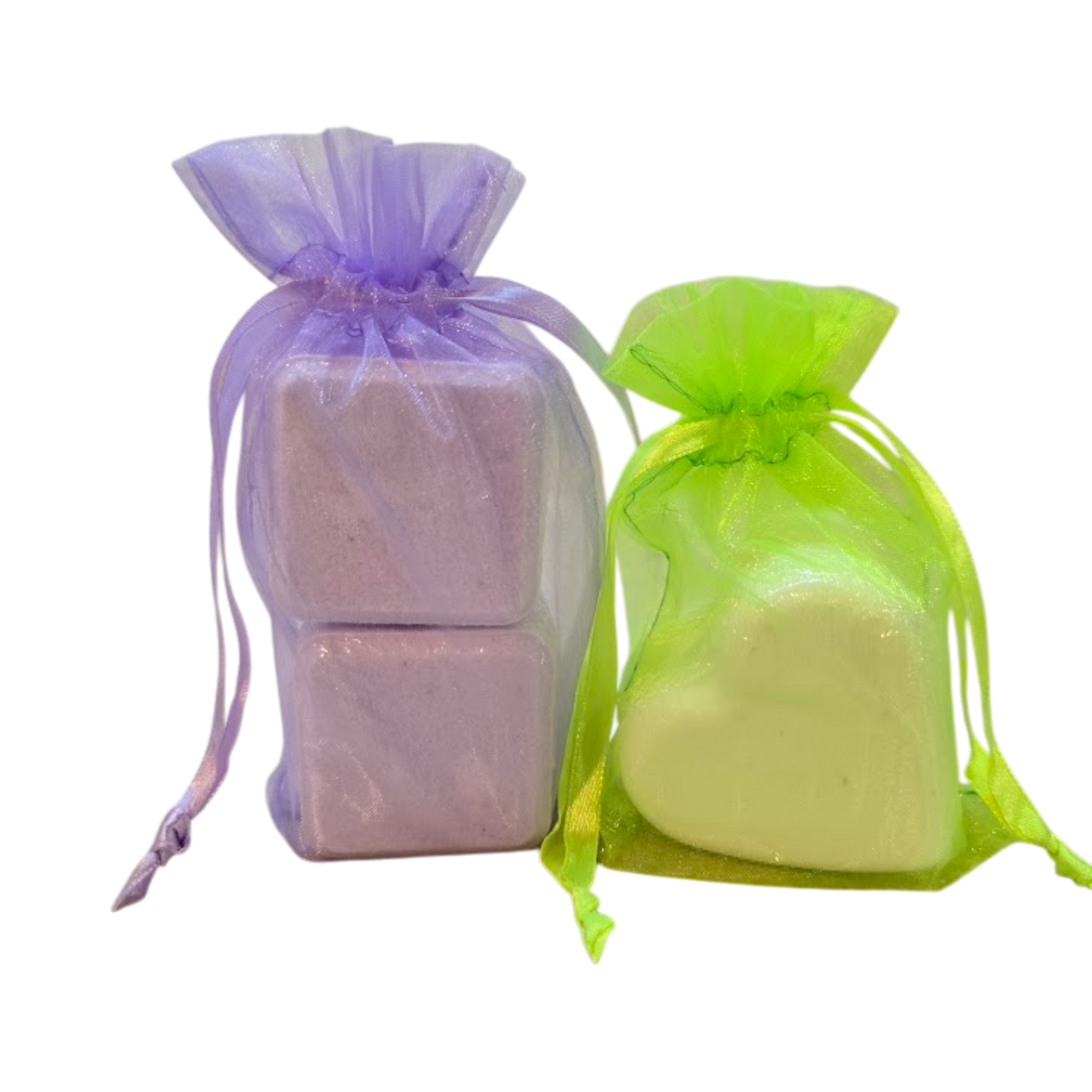 Shower Steamers in a lavender organza bag and a neon green organza bag