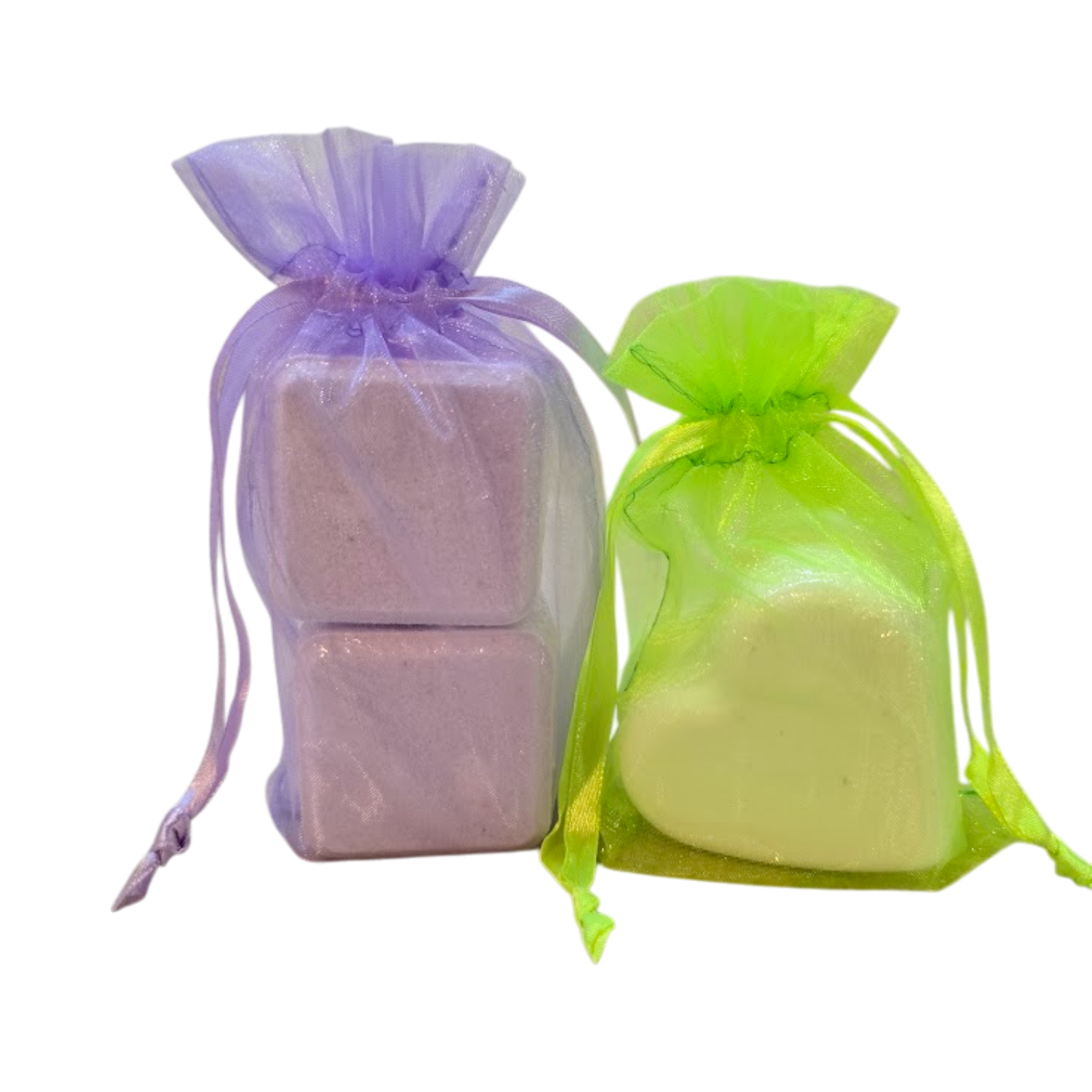 Shower Steamers in a lavender organza bag and a neon green organza bag