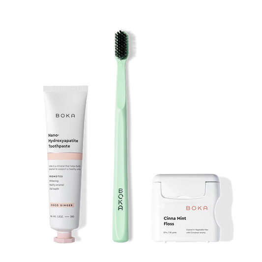 Boka Travel Kit: nano-hydroxyapatite toothpaste, charcoal toothbrush, and Teflon-free floss displayed.