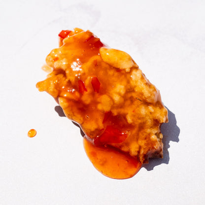 Blackbird Plant-Based Thai Chili Wings coated in sauce