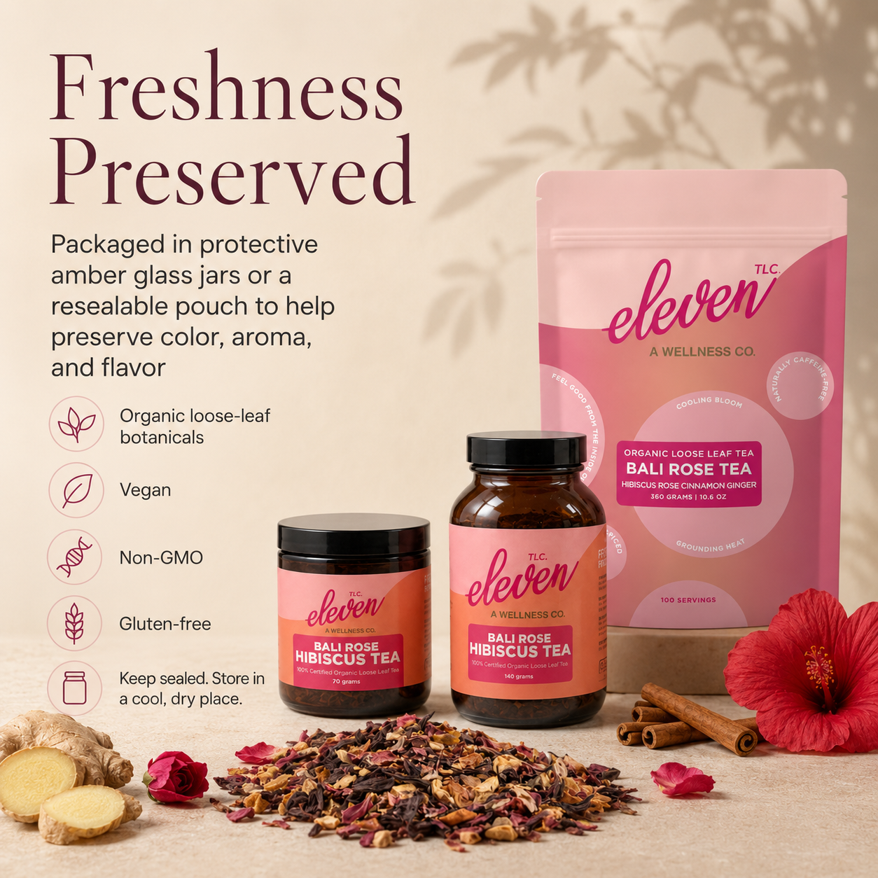 Bali Rose Hibiscus Tea in 70 gram and 140 gram amber glass jars with 360 gram pouch, styled with loose leaf tea, ginger, rose, hibiscus, and cinnamon, highlighting freshness-preserving packaging.
