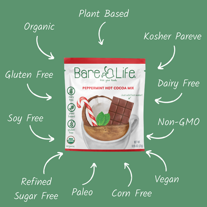 Bare Life peppermint hot cocoa packet with a graphic highlighting organic, plant-based, dairy-free, gluten-free, and vegan features