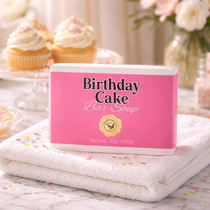 Birthday Cake bar soap box on a marbled countertop