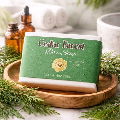 cedar forest bar soap box in a wooden tray with cedar sprigs around it