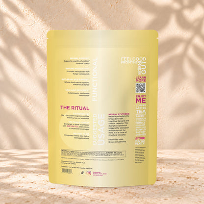 Back view of an Eleven TLC Lion’s Mane Mushroom Powder 500g pouch on warm travertine against a cream plaster wall with botanical shadows.