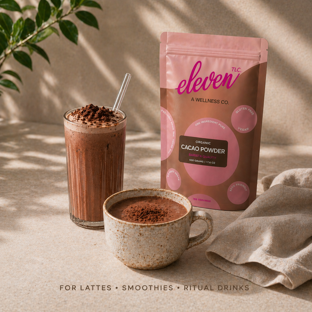 Eleven TLC Organic Cacao Powder pouch with an iced cacao drink and a cup of hot cacao.