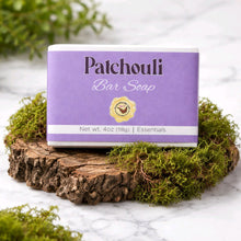 patchouli bar soap box on wood with moss