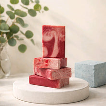 peppermint bar soap stack with jojoba beads on a round pedestal