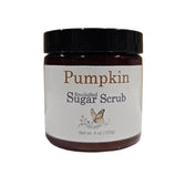 pumpkin emulsified sugar scrub shown in an amber jar