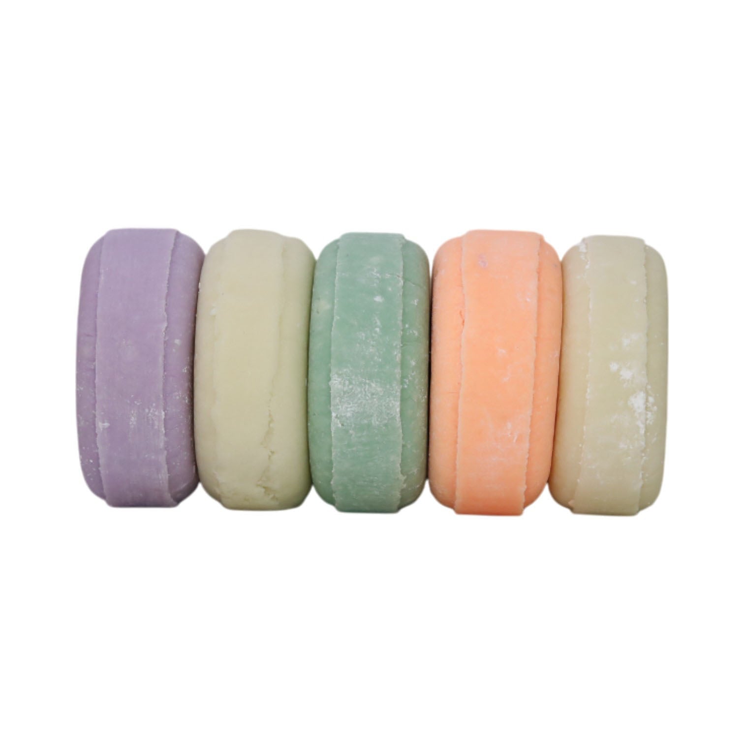 Colorful Solid Shampoo Bars stacked horizontally in purple, green, orange, and white