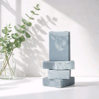 snow day bar soap stack with greenery in the background