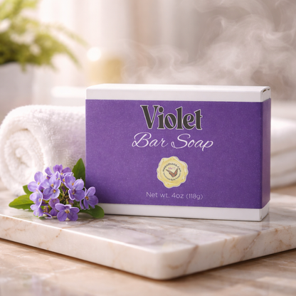 violet bar soap box on a marble slab with a lilac flower